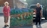 carrying in a large canvas